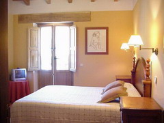 Foto de la habitacion clavel, en la Posada del Vallijo, en Cantabria